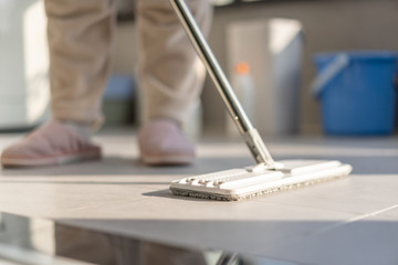 asia girl cleaning house