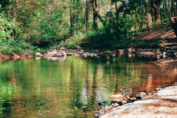 A Rapid Flowing River In an Autumn Landscape