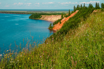 Obraz premium Andoma Cape with Andoma Hill at Onega Lake, Vologda region, Russia. Natural background view