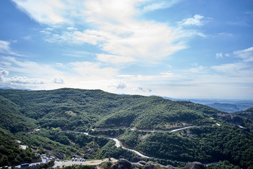 Obraz premium Legendary aerial drone view of ancient monasteries and breathtaking picturesque valley and landmark canyon of Meteora, Greece, Unesco
