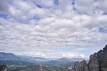 Fototapeta premium Legendary aerial drone view of ancient monasteries and breathtaking picturesque valley and landmark canyon of Meteora, Greece, Unesco