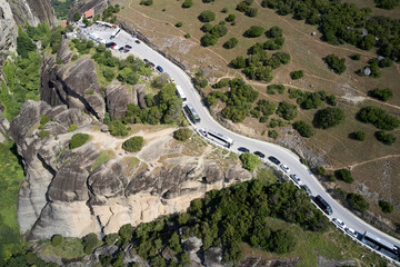 Legendary aerial drone view of ancient monasteries and breathtaking picturesque valley and landmark canyon of Meteora, Greece, Unesco