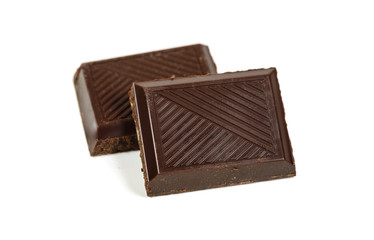 Pair of dark piece broken chocolate bar isolated on white macro