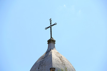 Fototapeta na wymiar Cross on church tower
