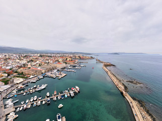 Panoramic drone aerial view from above of the city of Chania, Crete island, Greece. Landmarks of Greece, beautiful venetian town Chania in Crete island. Chania, Crete, Greece.