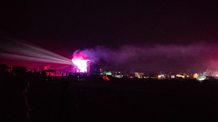 Hot air balloon flying over spectacular Cappadocia under the sky with milky way and shininng star...