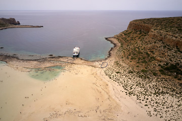 Amazing aerial drone top panoramic view on the famous Balos beach in Balos lagoon and pirate island...