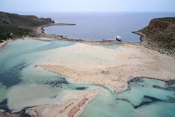 Amazing aerial drone top panoramic view on the famous Balos beach in Balos lagoon and pirate island...