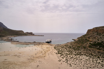 Amazing aerial drone top panoramic view on the famous Balos beach in Balos lagoon and pirate island...