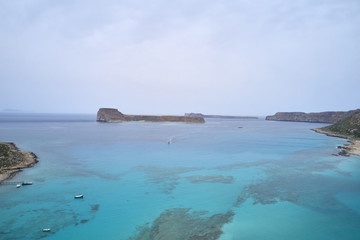 Amazing aerial drone top panoramic view on the famous Balos beach in Balos lagoon and pirate island...