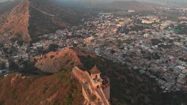 Aerial shoot of Amber fort and Jaipur city at sunset