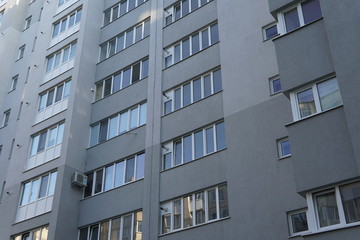 Fototapeta premium Modern condominium building real etate in city with blue sky