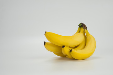 Yellow ripe banana close up on white background. Healthy fruit concept.