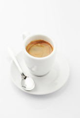 Cup of coffee isolated on white background. Close up. Copy space.