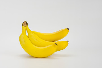 Yellow ripe banana close up on white background. Healthy fruit concept.