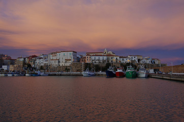 The harbor with fishing boats and in the background the old village, Termoli, Molise, Italy