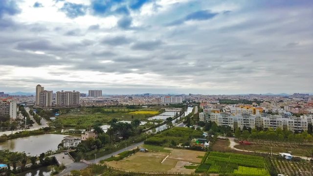 time lapse of small Chinese town in a cloudy day