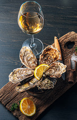 Fresh oysters with lemon ice and white wine.