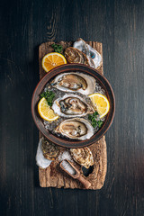 Fresh oysters with lemon ice and white wine.