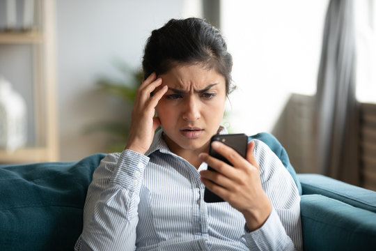 Frustrated girl feel stressed with cellphone problems