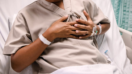 Obraz na płótnie Canvas man having heart attack .Healthcare and medical concept.