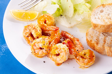 Grilled tiger shrimps in spices, sweet and sour sauce