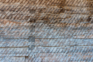 Old, rough , traditional wood house wall close up shot for background.