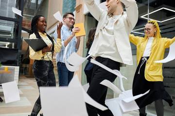 funny stylish women and men having fun at the office, celebration, victory, good luck, free time,...