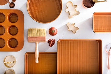 A set of copper baking forms, with the addition of gold and copper elements - baking molds for cookies and gingerbread and measuring spoons