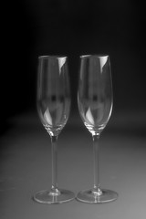 2 champagne or prosecco glasses with black background