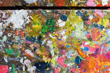 Obraz na płótnie Canvas Art paint background of bright multi coloured and textured painted surface