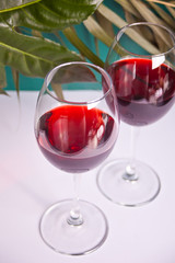 Two glasses with red grape wine. Romantic dinner concept.