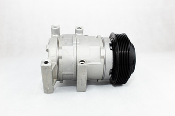 Car compressor on white background