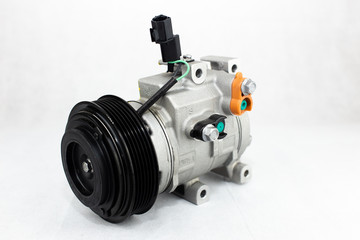 Car compressor on white background