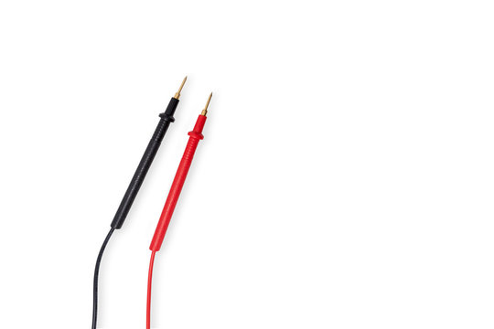 Positive and negative multimeter probe or pin plug isolated on white background, industrial and education concept.