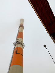 View on industrial chimney from bottom