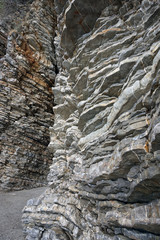 Budva, Montenegro - 7th October 2017 : Budva seaside and coastline. Along with the coast, there is Ballet Dancer Statue Budva and stone cliff on the mountain.