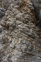 Budva, Montenegro - 7th October 2017 : Budva seaside and coastline. Along with the coast, there is Ballet Dancer Statue Budva and stone cliff on the mountain.