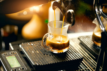 coffee extraction from professional coffee machine . Espresso coffee 