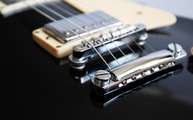 Electric guitar body with pickups and control knobs