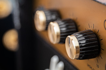 Obraz na płótnie Canvas Guitar amplifier knobs
