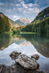 Fototapeta premium Lake Planšarsko jezero in Zgornje Jezersko with Kamnik-Savinja Alps
