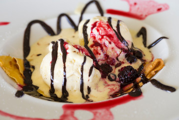Crepe with vanilla ice cream and red fruits, ready to eat.