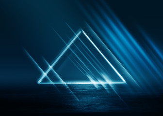 Dark blue abstract futuristic background. Laser geometric figure of a triangle in the center of the stage. Neon light, reflection on the asphalt, smoke, smog