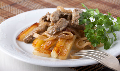 Beef liver with mushrooms and onions