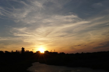 Obraz premium Fiery orange sunset sky. Beautiful sky.