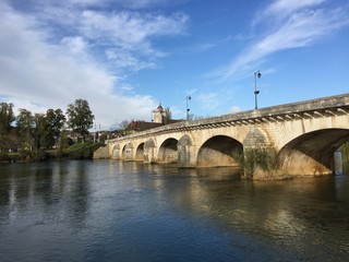 The Grand-Pont de Dole bridge and the Doubs river in Dole, France.