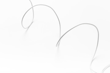 white new wire cable isolated on a white background abstraction.