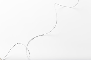 Fototapeta premium white new wire cable isolated on a white background abstraction.