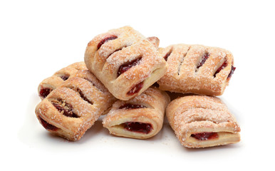 Pile of fresh cookies with cherry jam isolated
